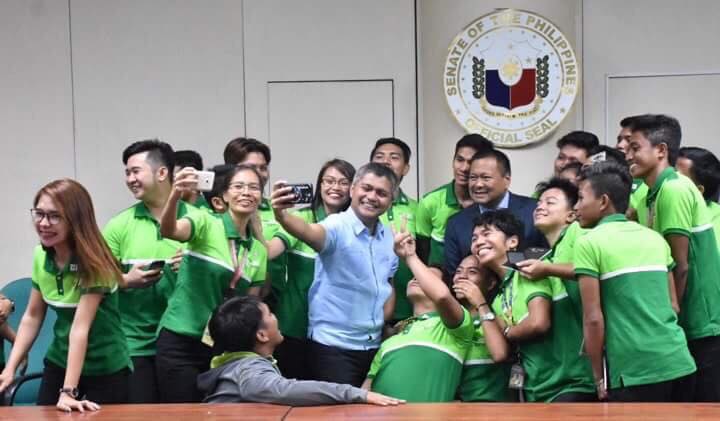Senator JV Ejercito shares a light moment with members of the Federation of Student Councils of Oriental Mindoro